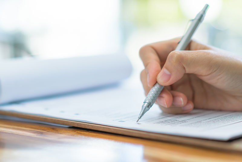 dental patient filling out forms